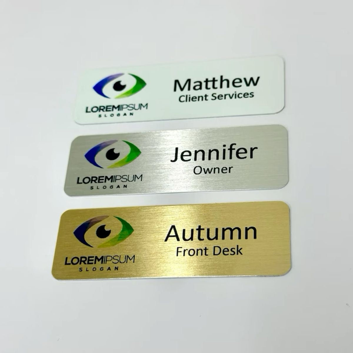 Personalized custom metal aluminum name badges with your company logo. Magnetic or pin attachment.