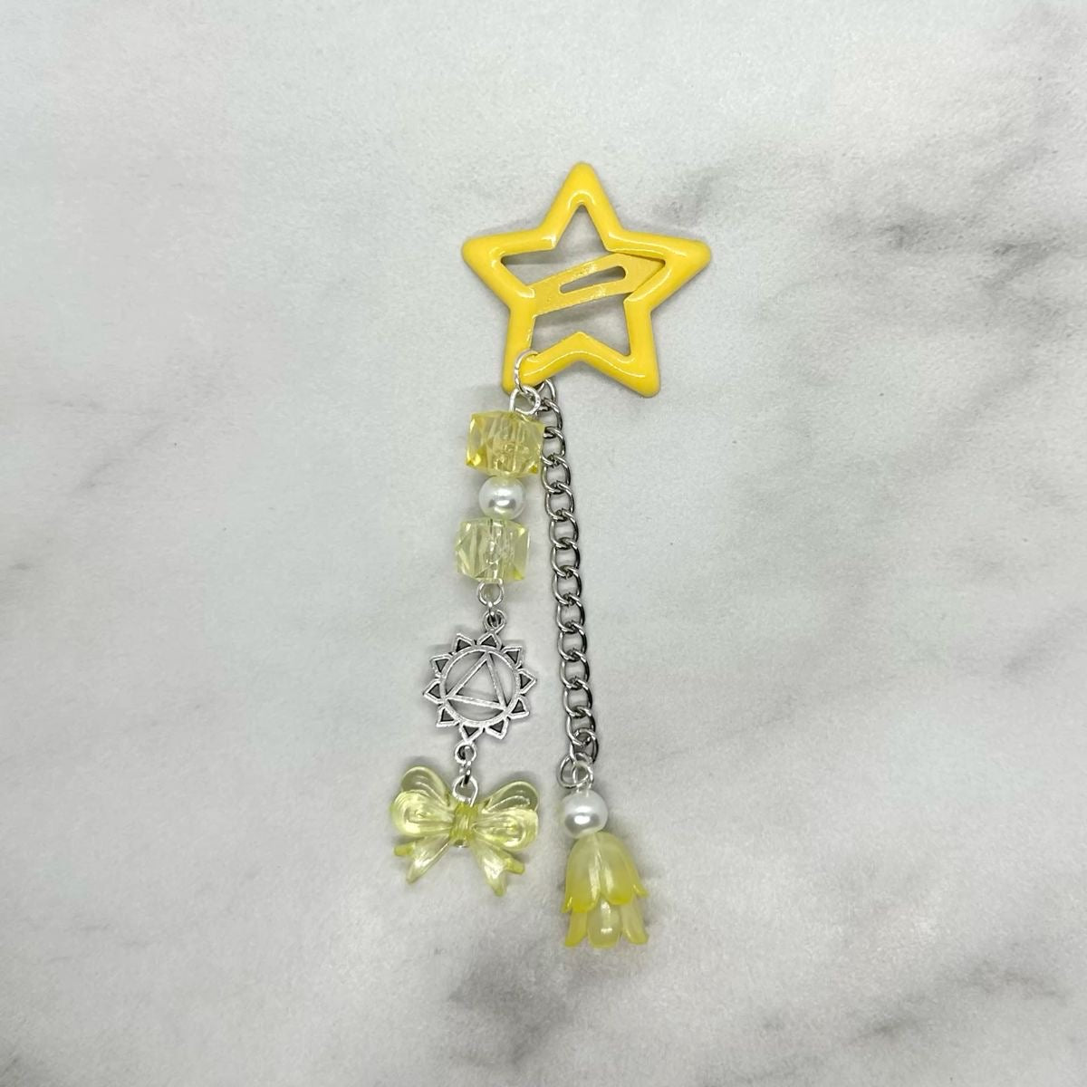 Cute Y2K inspired Yellow Star shaped Hair Clip Barrette with beads and charms.