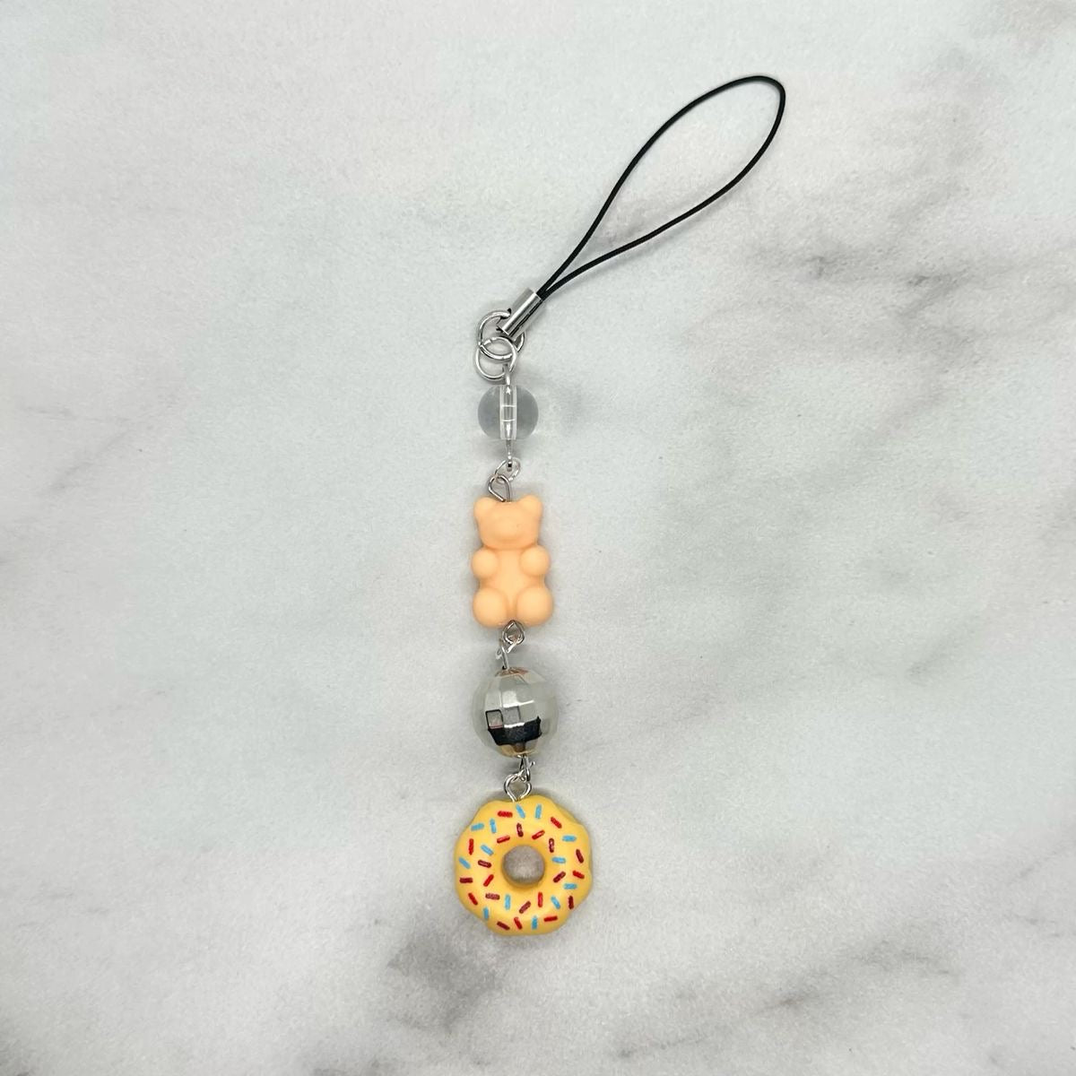 cute peach colored coquettish single strand cell phone charm