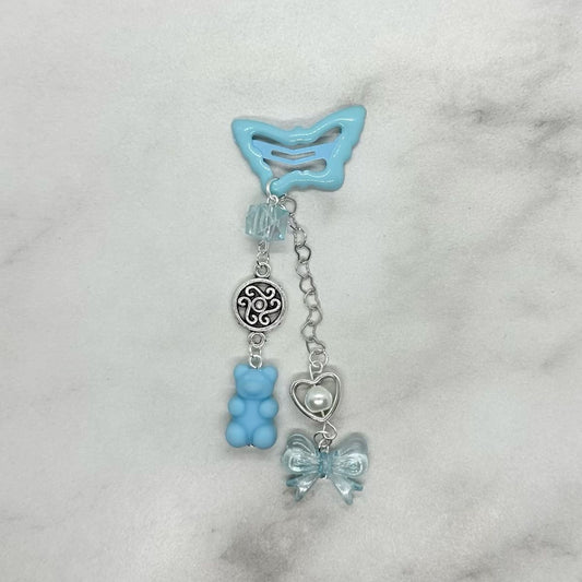 Cute blue butterfly hair clip barrette with beads and charms.