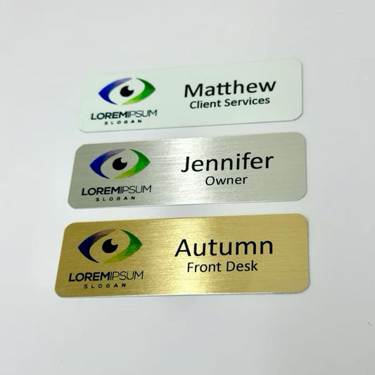 Personalized custom metal aluminum name badges with your company logo. Magnetic or pin attachment.