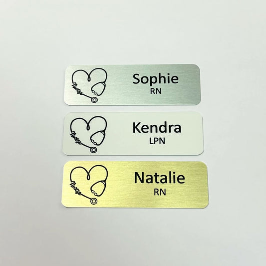 custom personalized gold, silver, or white metal aluminum medical nurse name tags with stethoscope heart. magnet or pin attachment.