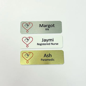 custom personalized gold, silver, or white metal aluminum medical nurse name tags with red stethoscope heart. magnet or pin attachment.