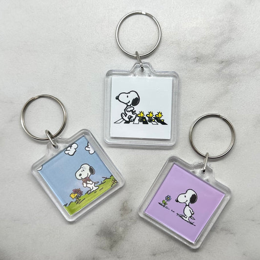 Cute acrylic photo keychains of Snoopy and Woodstock. Gifts for her.