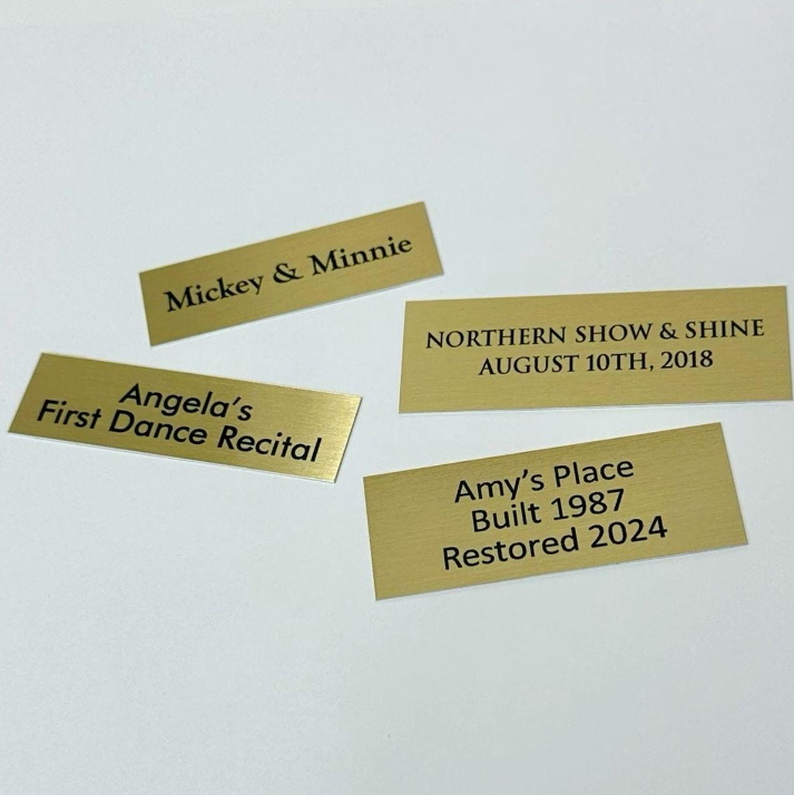 Gold custom personalized metal aluminum name plates with adhesive backing. Multiple font choices and sizes.